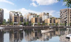 Impressie van hoe het project Caland Dock in Den Haag met witte en lichtoranje appartemenetncomplexen langs het water